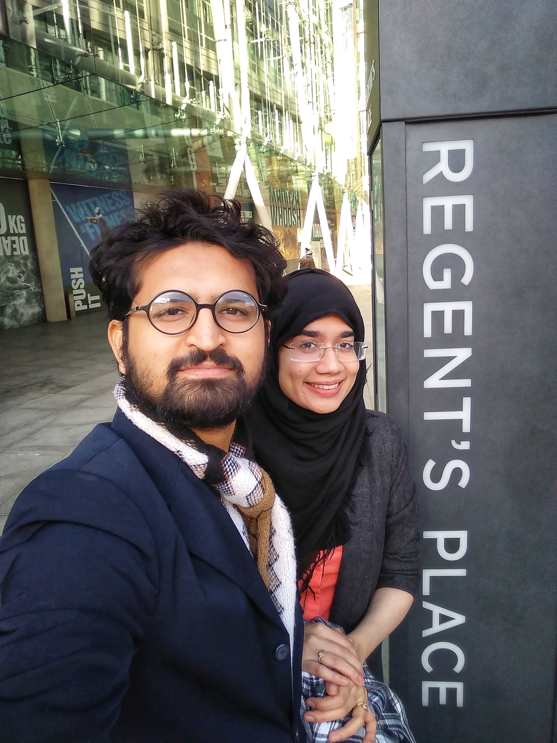 Two doctors in front of GMC Building